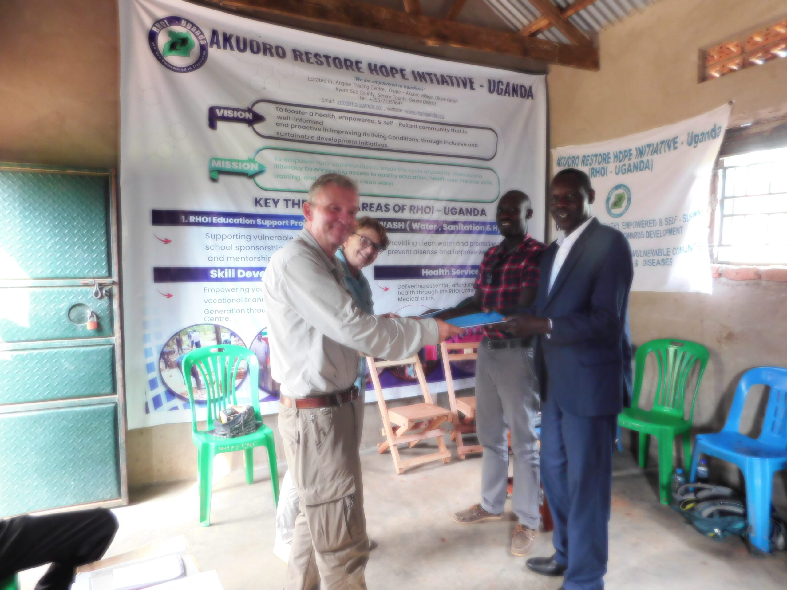 Dr. Klaus Bender with RHOI-Uganda Team
